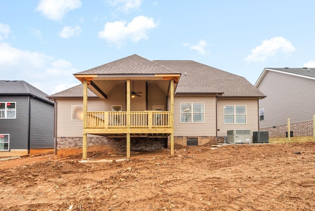 back of property featuring central AC unit and ceiling fan