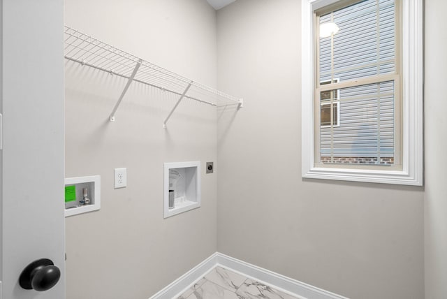 clothes washing area with hookup for a washing machine and electric dryer hookup