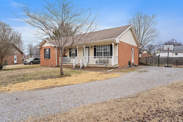 view of front of home featuring a porch and a front lawn