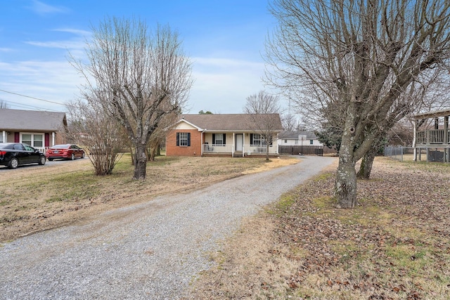 view of front of property featuring covered porch