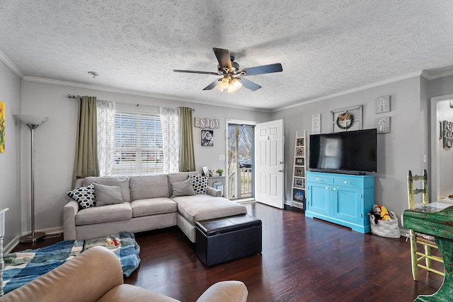 living room featuring ceiling fan, ornamental molding, and dark hardwood / wood-style flooring