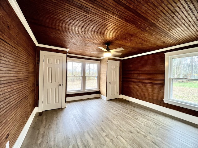 bonus room with hardwood / wood-style flooring, ceiling fan, and wooden ceiling