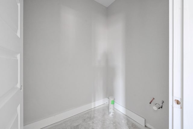 bathroom featuring concrete flooring