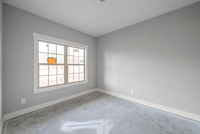 spare room featuring concrete floors