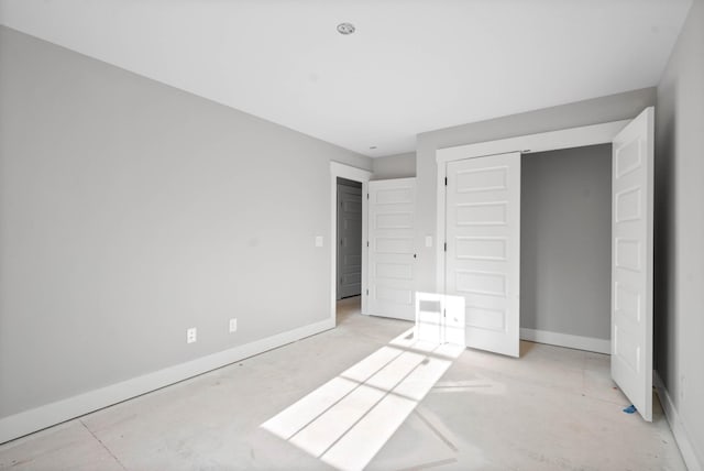 unfurnished bedroom with a closet