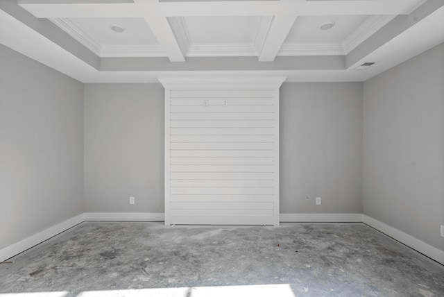 unfurnished room featuring coffered ceiling, ornamental molding, and concrete floors