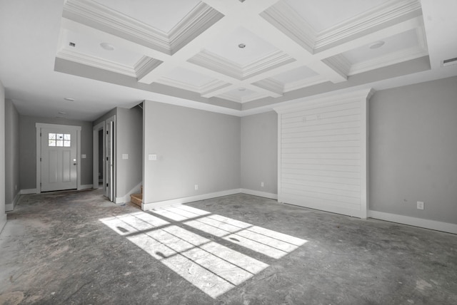 unfurnished living room featuring crown molding, coffered ceiling, and beam ceiling