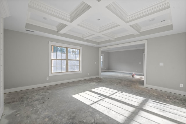 empty room featuring coffered ceiling, beam ceiling, and ornamental molding