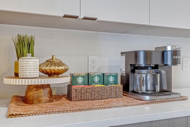 635 7th Ave S Unit 211, Nashville, TN 37203 - kitchen view of decorative backsplash and stone countertops