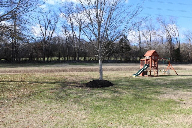 view of yard featuring playground community