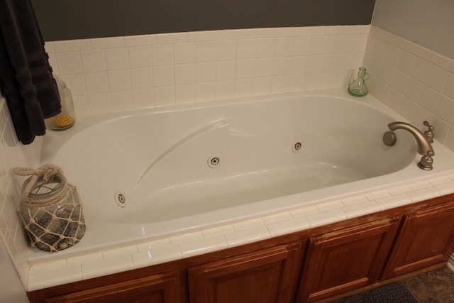 bathroom with a whirlpool tub