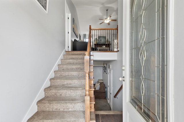 stairs with ceiling fan