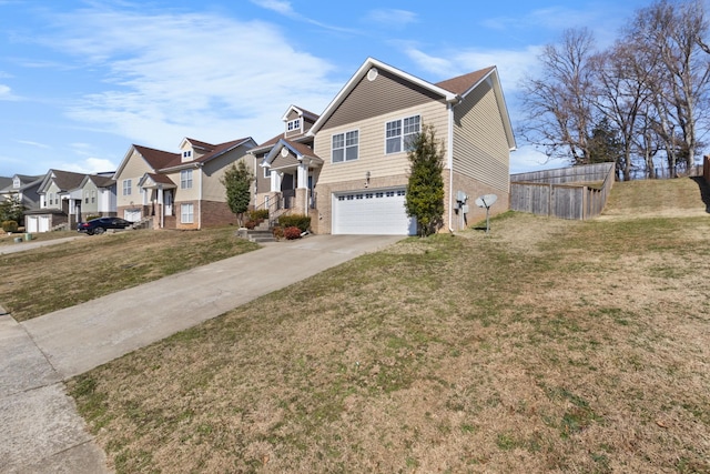 view of front facade with a garage and a front yard