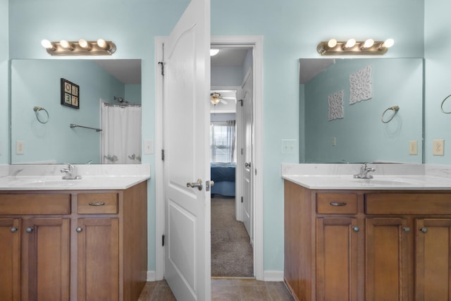 bathroom with vanity and a shower with curtain