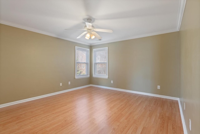 spare room featuring ceiling fan, ornamental molding, and light hardwood / wood-style floors