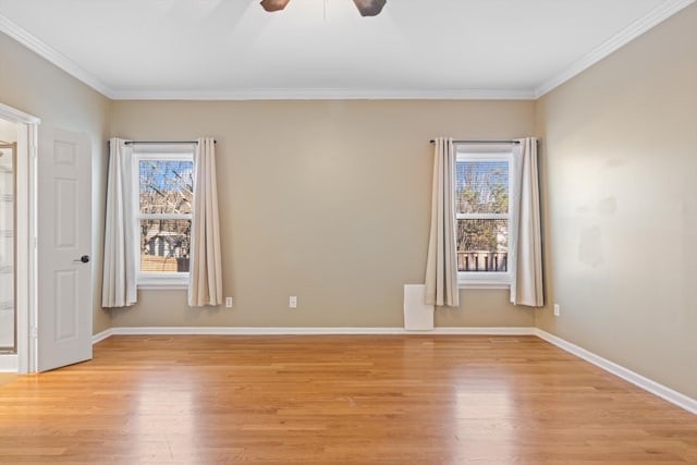 unfurnished room with light hardwood / wood-style floors, ceiling fan, and ornamental molding