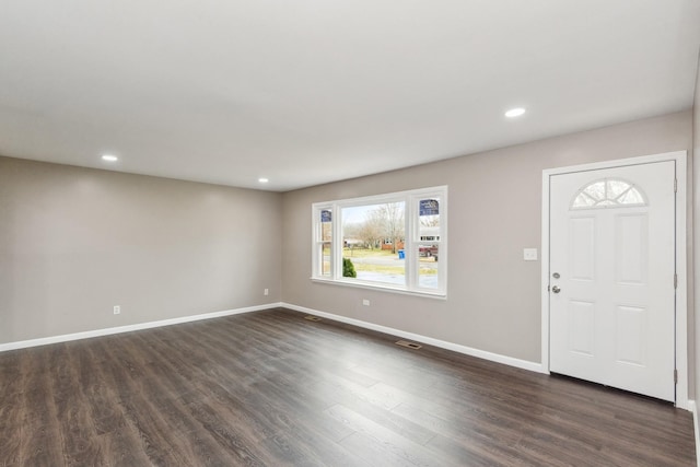 foyer featuring dark hardwood / wood-style floors