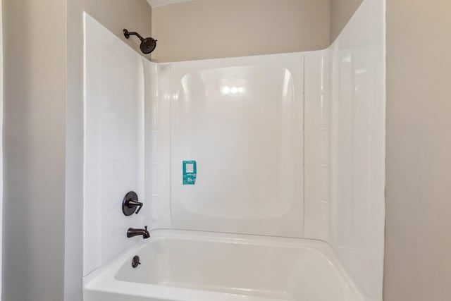 bathroom featuring  shower combination