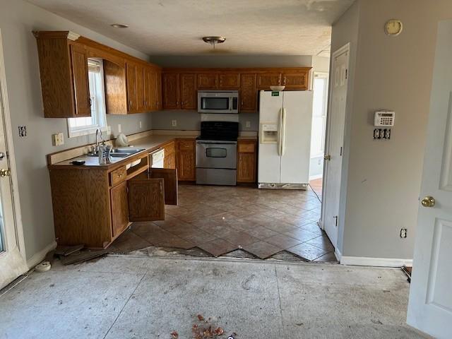 kitchen featuring stainless steel appliances and sink