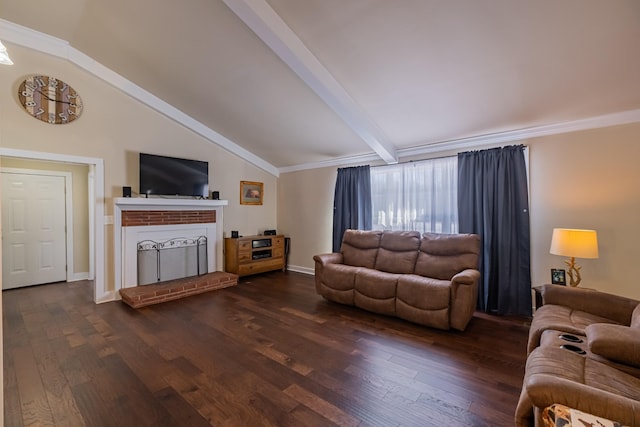 living room featuring dark wood-type flooring, crown molding, lofted ceiling with beams, and a brick fireplace