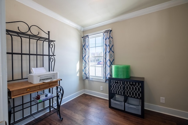 sitting room with dark wood-type flooring and ornamental molding