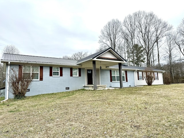 ranch-style house with a front lawn