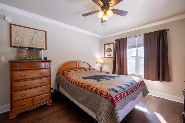 bedroom with dark wood-type flooring, ornamental molding, and ceiling fan