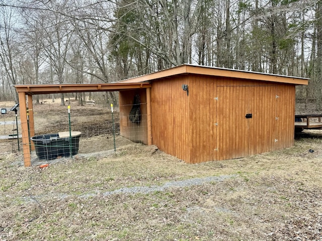 view of outdoor structure featuring central AC unit