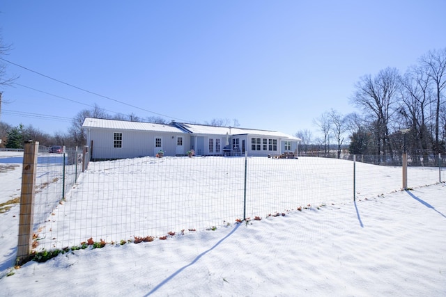 view of snow covered property