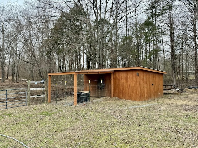 view of outbuilding featuring central AC