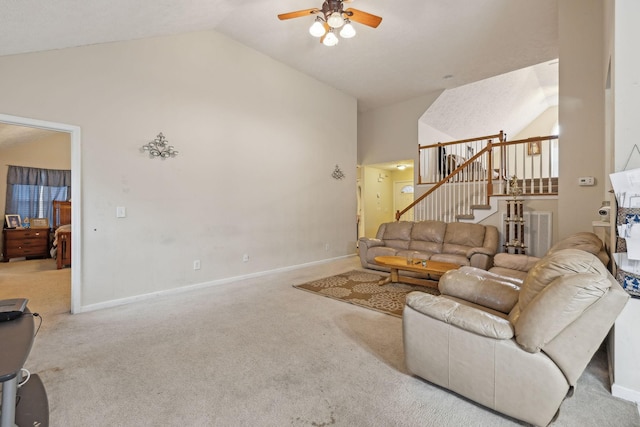 carpeted living room featuring high vaulted ceiling and ceiling fan