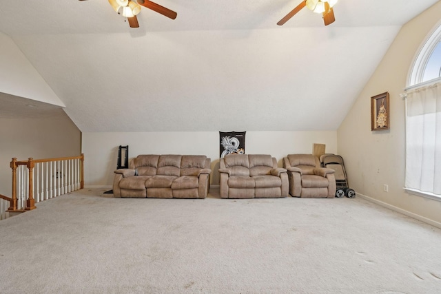 interior space featuring lofted ceiling and ceiling fan