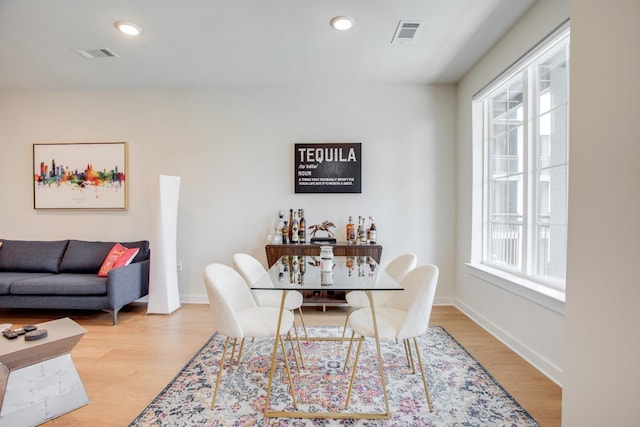 dining room featuring wood-type flooring