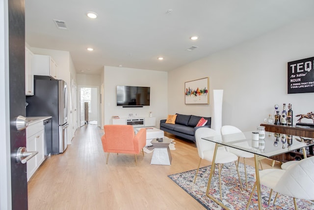 living room featuring light hardwood / wood-style floors