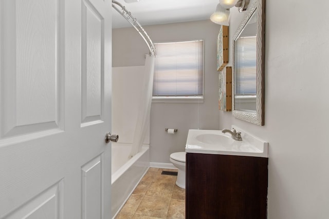 full bathroom with toilet, vanity, and bathtub / shower combination