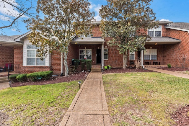 view of front of house with a front lawn