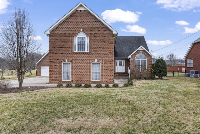 view of front of property featuring a garage and a front yard