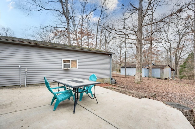 view of patio / terrace featuring a shed