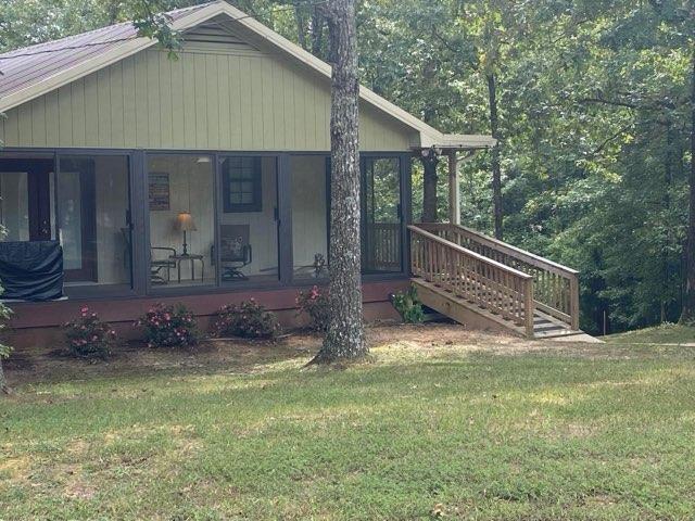 exterior space with a lawn