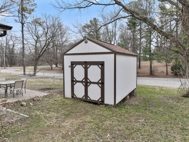 view of outdoor structure with a lawn