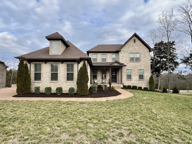 view of front of house with a front lawn