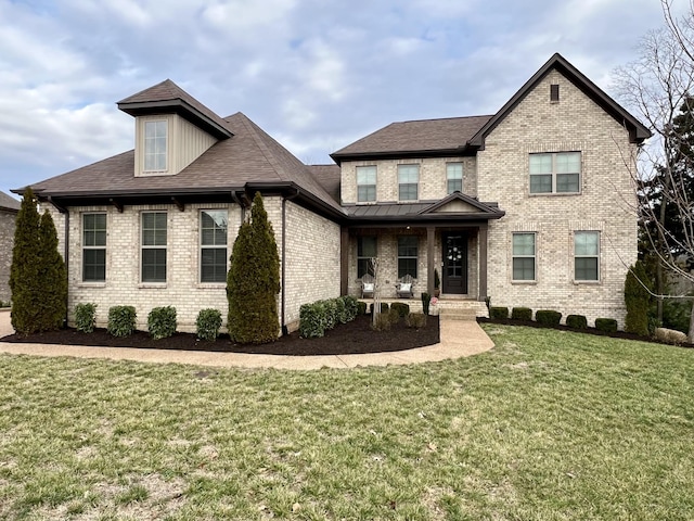 view of front of house with a front lawn