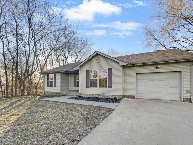 ranch-style home featuring a garage