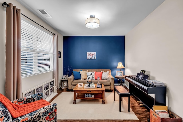 living area with wood-type flooring