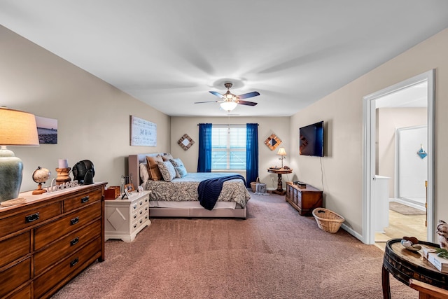 carpeted bedroom featuring ceiling fan