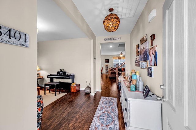 hall with dark hardwood / wood-style floors