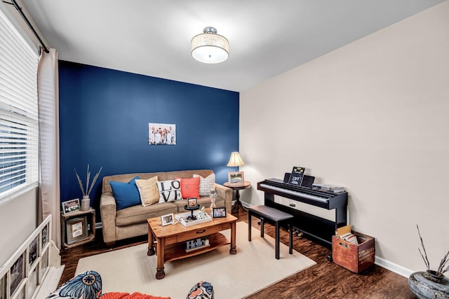 sitting room with dark hardwood / wood-style floors