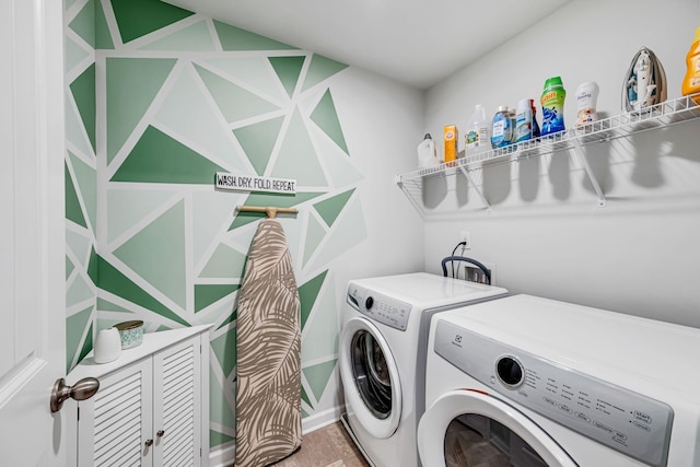 laundry room featuring washer and clothes dryer