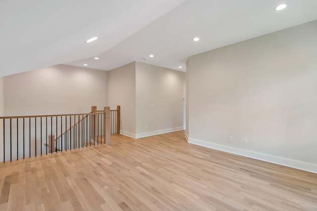 unfurnished room with light hardwood / wood-style floors