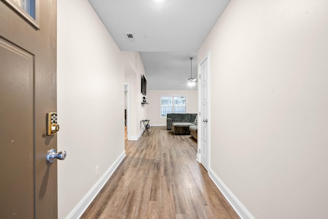 hall featuring hardwood / wood-style floors